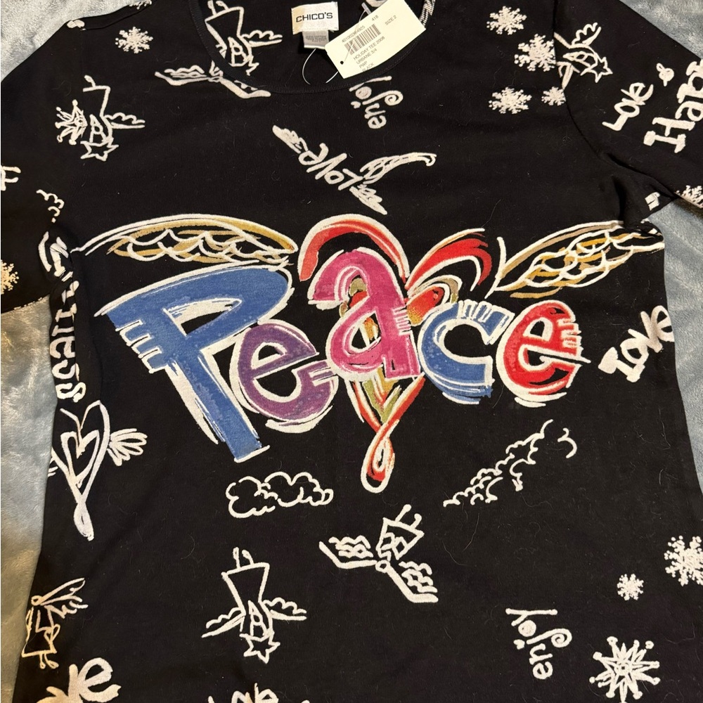 Woman’s size 2 shirt by Chico’ss